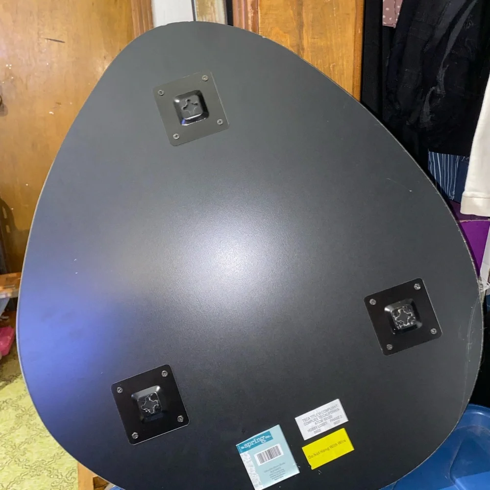 Mirror that is odd shaped. It says 20x22 for sizing